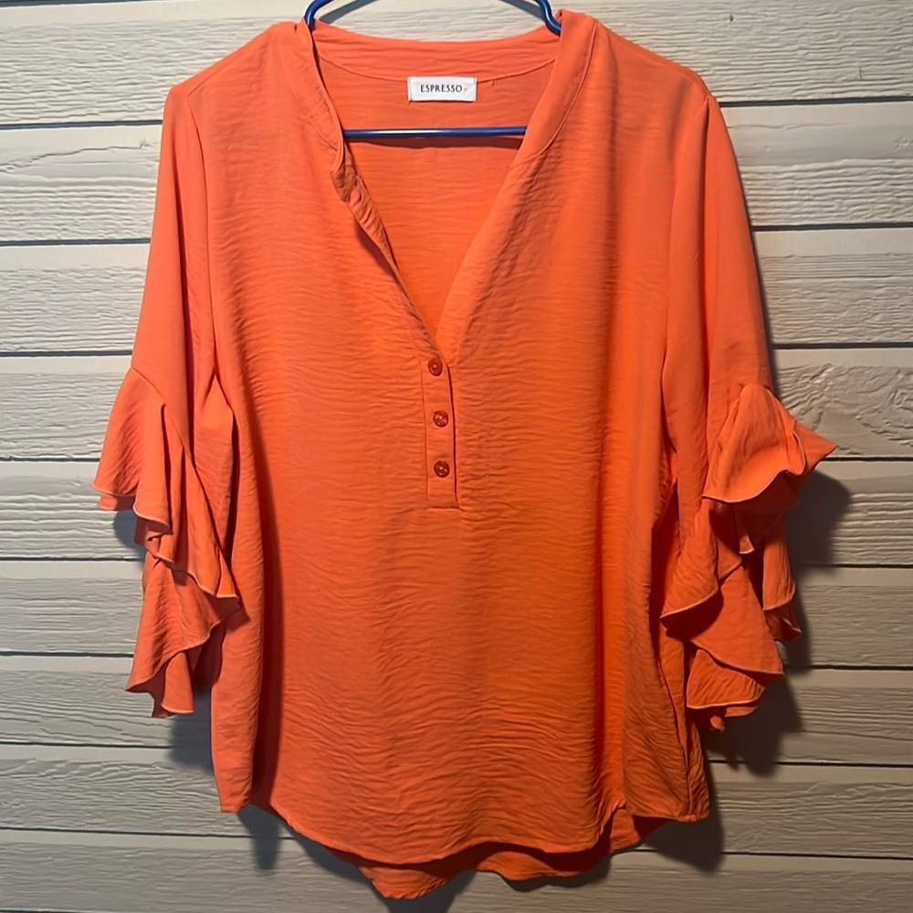 Never worn, women’s size XL Expresso Salmon color shirt.